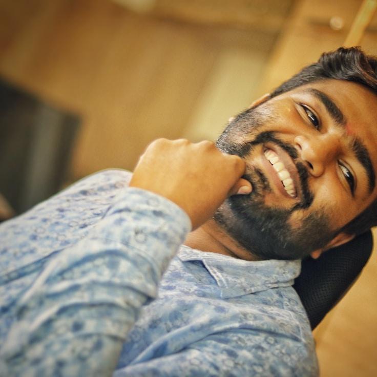 Kaveri Mehta, Lead Design Curator at LedgerFolioArchive, reviewing corporate floral arrangements